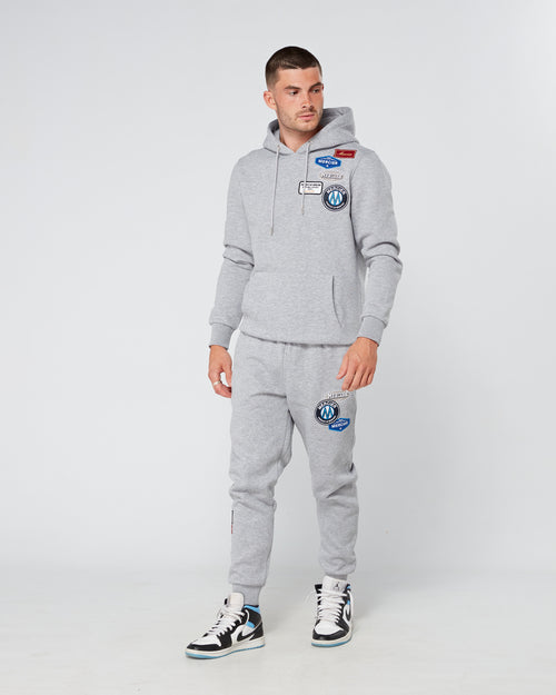 Jogging grigio marl e distintivo