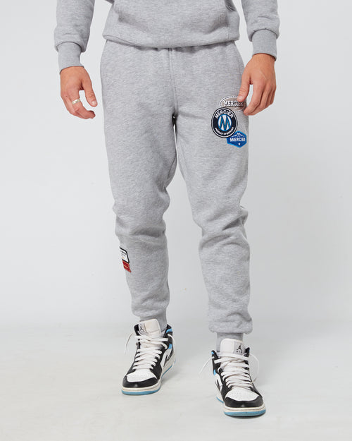 Jogging grigio marl e distintivo