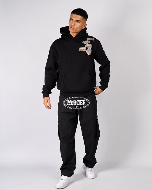 Sweats à capuche noirs Camo AND Badge