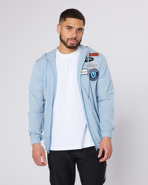 Sky Blue OG Badge Windbreaker