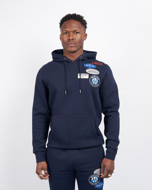 Navy Mercier und Abzeichen Hoodie.